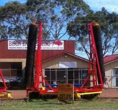 40 foot roller in front of Bison Engineering